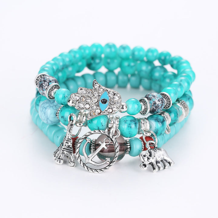 Ensemble de bracelets Hamsa contre le mauvais œil avec la tour de l'éléphant Olivenorma
