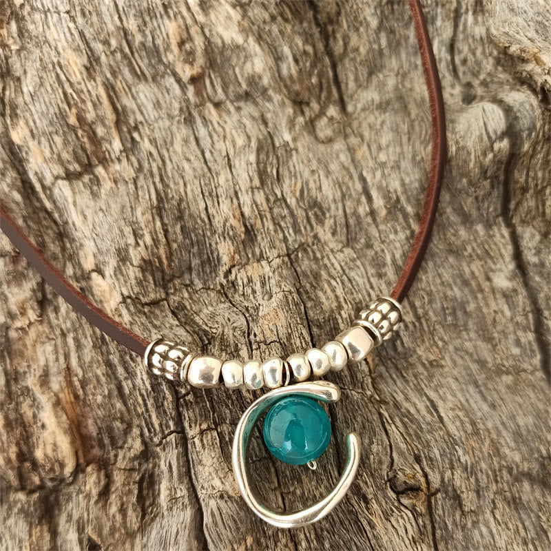 Collier en cuir avec pendentif demi-anneau en aigue-marine Olivenorma