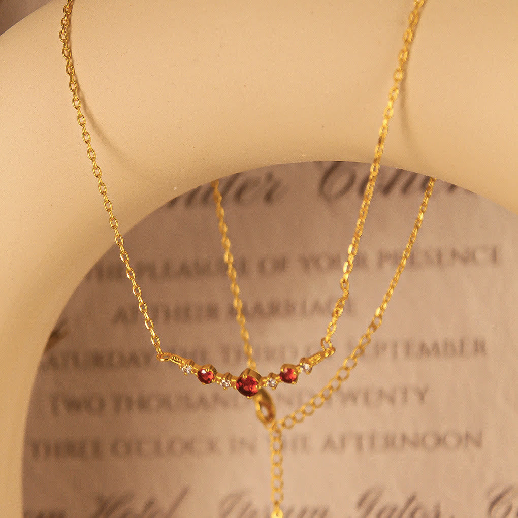 Collier Olivenorma « Symbole d'indépendance » avec diamants et grenats