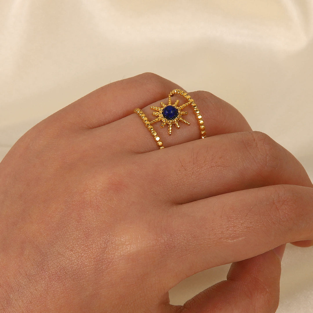 Bague Olivenorma en forme d'étoile à huit branches et à double rangée de tournesols 