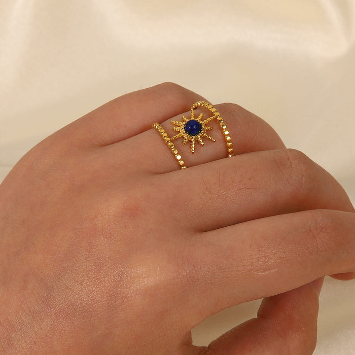 Bague Olivenorma en forme d'étoile à huit branches et à double rangée de tournesols 