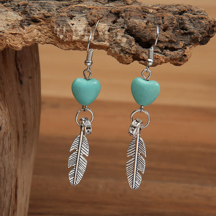 Boucles d'oreilles vintage en forme de cœur et de plumes turquoise