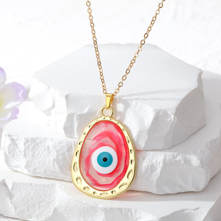 Collier en époxy multicolore contre le mauvais œil Olivenorma 