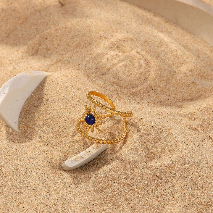 Bague Olivenorma en forme d'étoile à huit branches et à double rangée de tournesols 