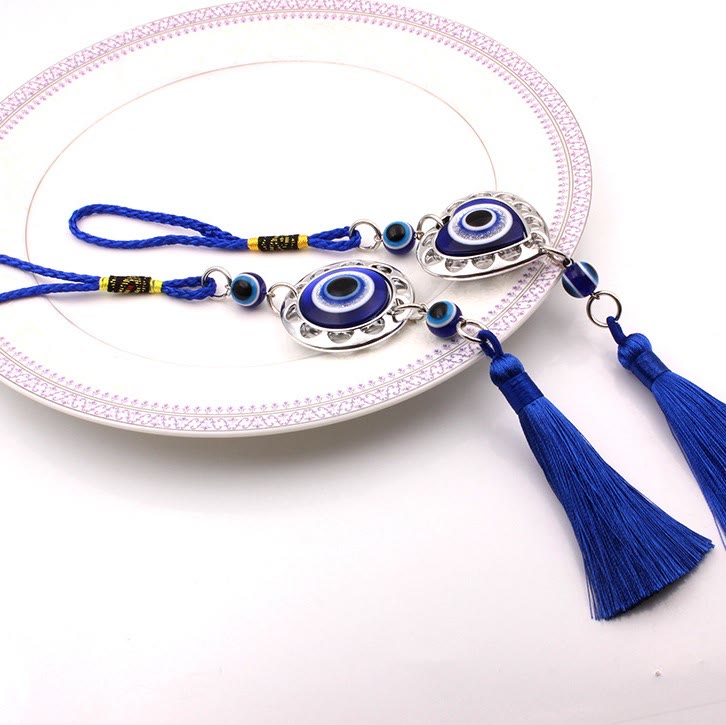 Décoration de voiture à pompon bleu contre le mauvais œil Olivenorma 