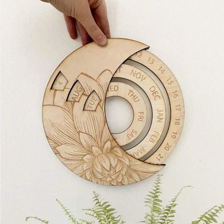 Calendrier perpétuel en forme de croissant de lune en bois avec cercle Olivenorma pour décoration murale