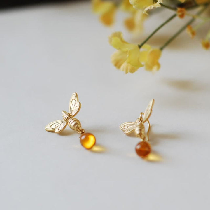 Boucles d'oreilles et collier en ambre avec pendentif en forme de goutte d'eau et de miel Olivenorma Bee Topaz