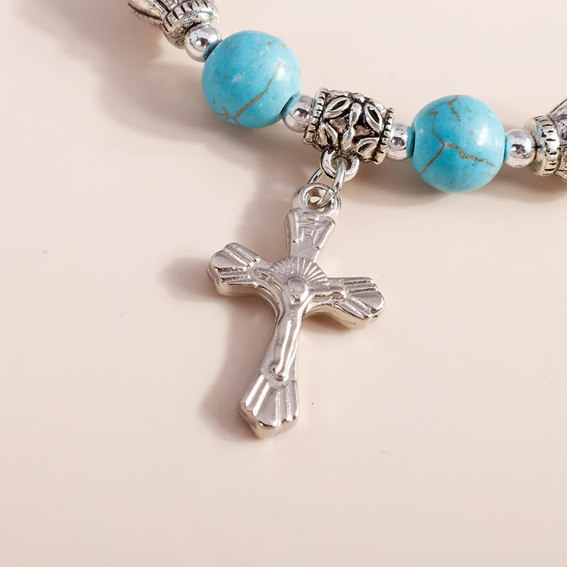 Bracelet pendentif croix en perles turquoise Olivenorma
