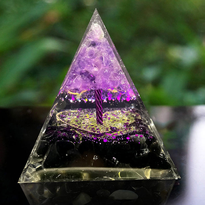 Sphère d'améthyste Olivenorma avec pyramide d'orgone en obsidienne 