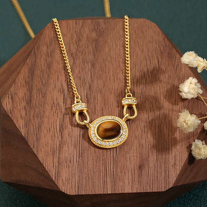 Collier rétro en pierre œil de tigre Olivenorma « Le livre de la galaxie »