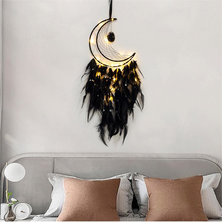 Pendentif Olivenorma en onyx noir et attrape-rêves en plumes noires
