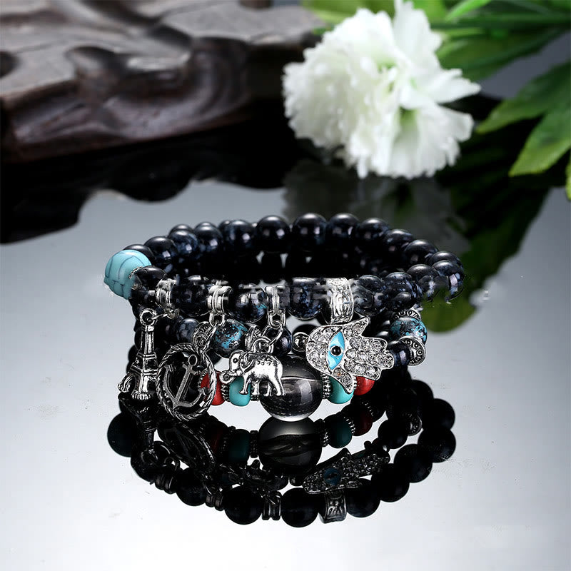 Ensemble de bracelets Hamsa contre le mauvais œil avec la tour de l'éléphant Olivenorma