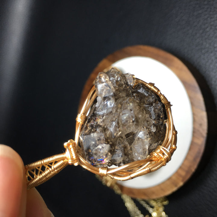 Collier avec pendentif enroulé en fil de cuivre et quartz fumé naturel Olivenorma