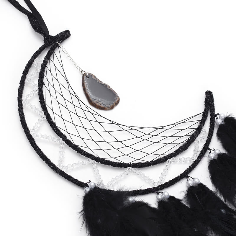 Pendentif Olivenorma en onyx noir et attrape-rêves en plumes noires