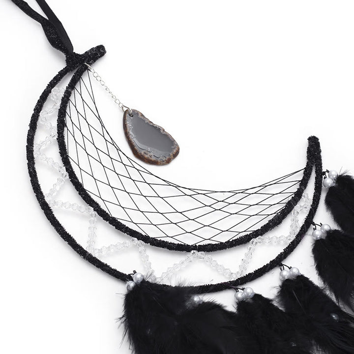 Pendentif Olivenorma en onyx noir et attrape-rêves en plumes noires