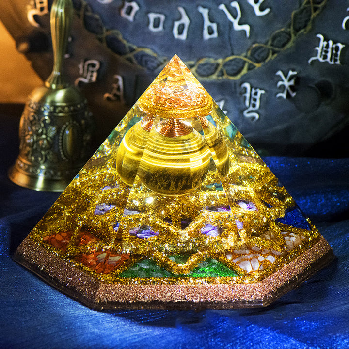 Tour de cristal hexaédrique en œil de tigre de lumière sacrée Olivenorma , pyramide orgonite