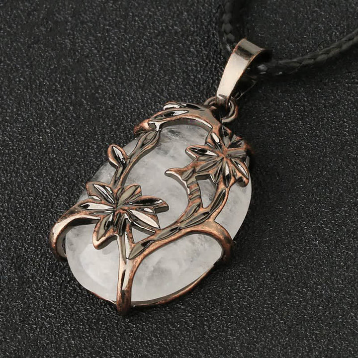 Collier en cristal enveloppé de fleurs en laiton et améthyste Olivenorma