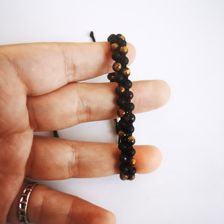 Bracelet tressé en perles d'onyx noir et œil de tigre Olivenorma 