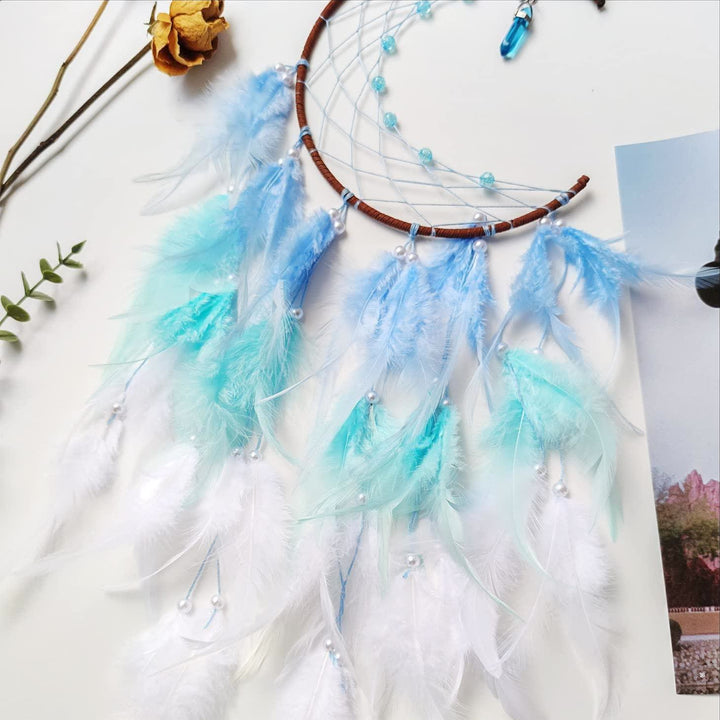 Attrape-rêves pendentif lune avec topaze bleue Olivenorma