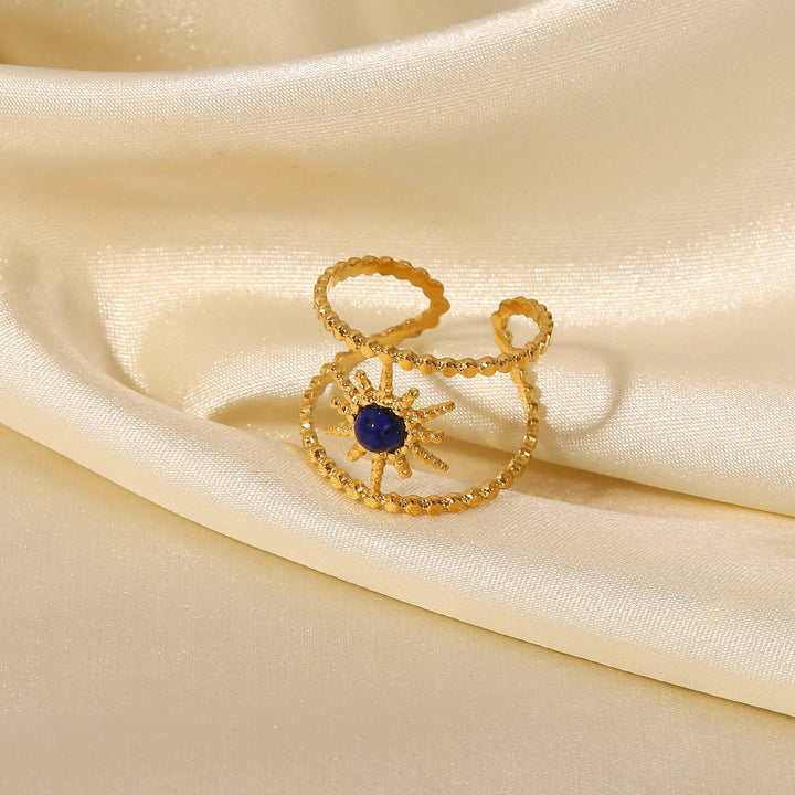 Bague Olivenorma en forme d'étoile à huit branches et à double rangée de tournesols 
