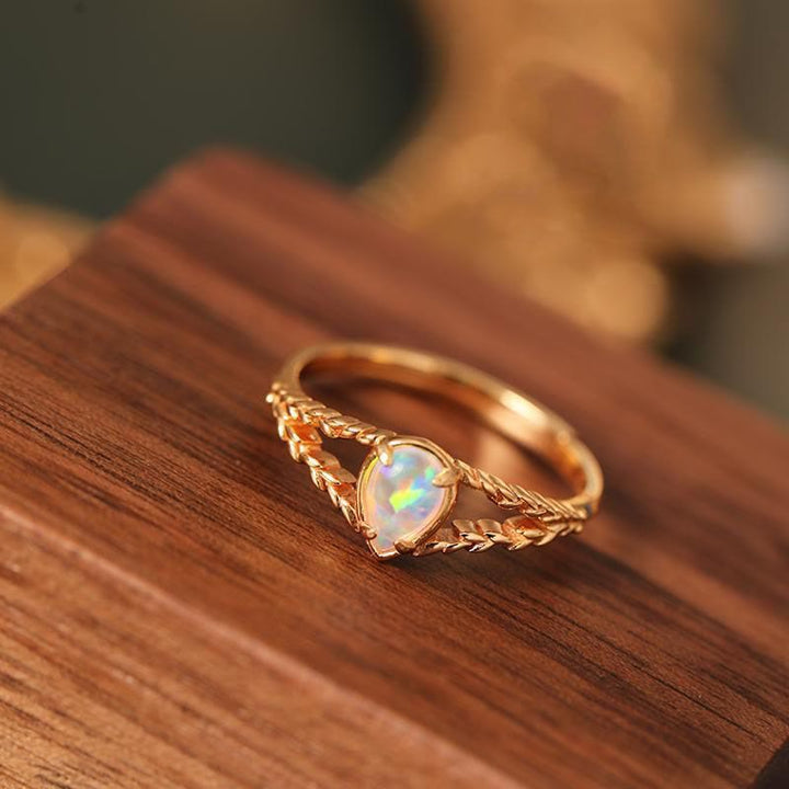 Bague creuse en or avec pierre d'opale Olivenorma