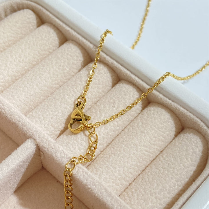 Collier avec pendentif soleil turquoise Olivenorma plaqué or 18 carats