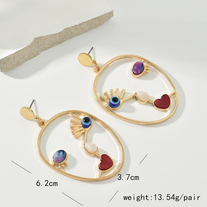 Boucles d'oreilles pendantes en agate rouge avec mauvais œilnorma Olivenorma