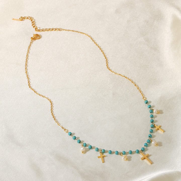 Collier à pampilles avec pendentif en croix et perles turquoise Olivenorma