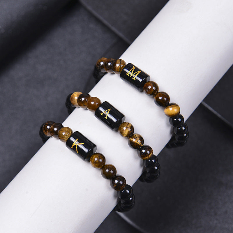 Bracelet en œil de tigre avec lettre en obsidienne - image 2