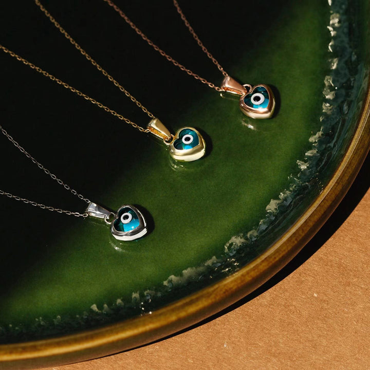 Collier en acier titane avec topaze bleue et mauvais œil Olivenorma