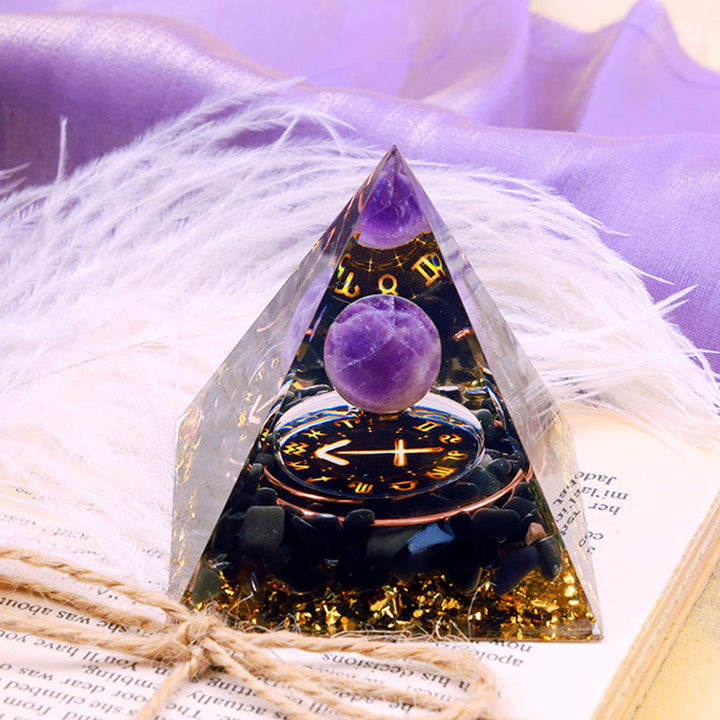 Sphère d'améthyste Olivenorma avec pyramide d'orgone du zodiaque Sagittaire en obsidienne 
