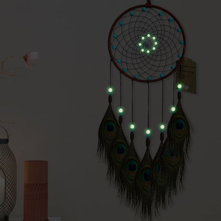 Attrape-rêves en plumes de paon fait main avec perles phosphorescentes Olivenorma
