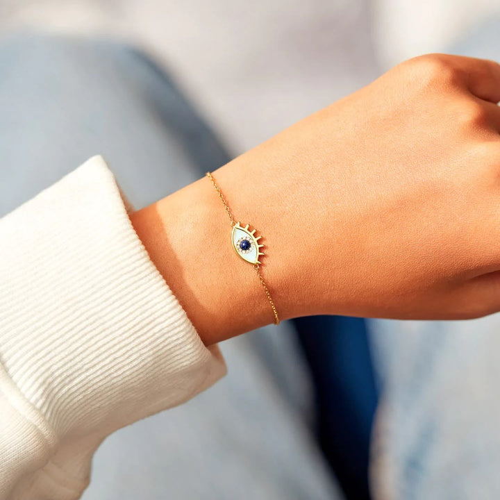 Bracelet fin en or et zircone contre le mauvais œil Olivenorma « SAFE &amp; PROTECTED »