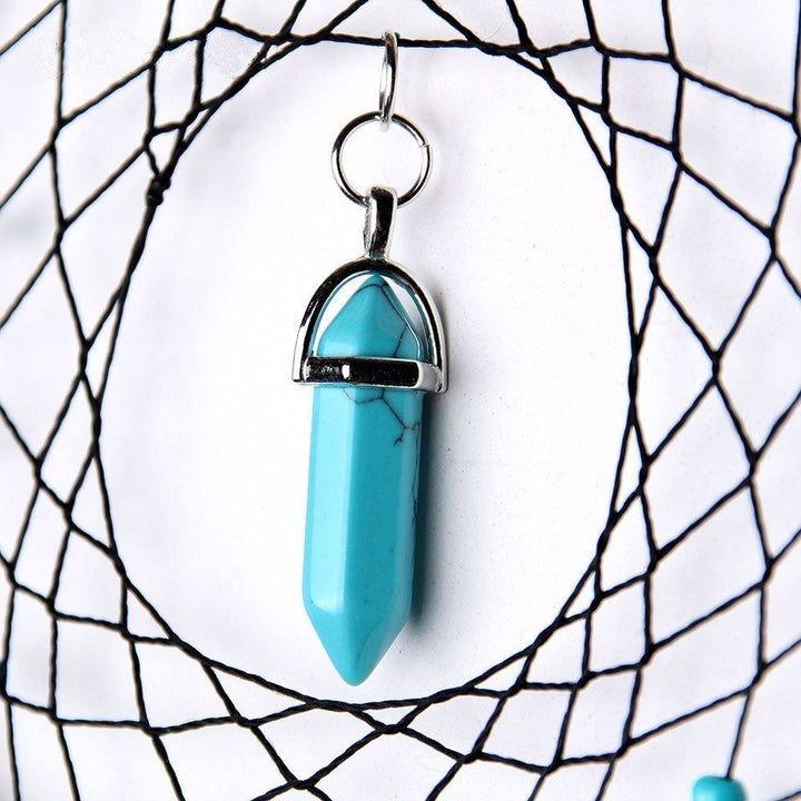 Attrape-rêves traditionnel en plumes turquoise fait main Olivenorma