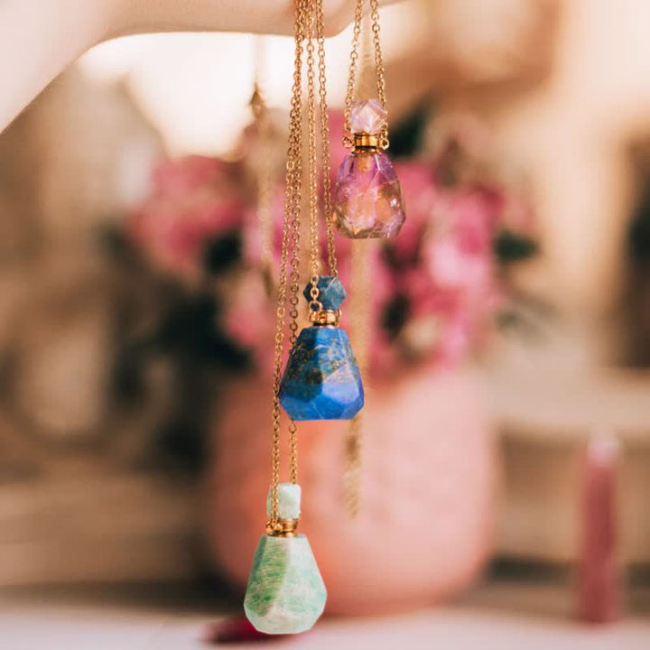 Collier bouteille de parfum en cristal