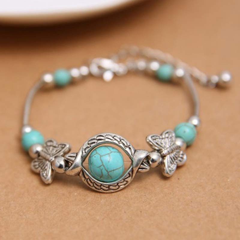 Bracelet papillon en sphère turquoise Olivenorma