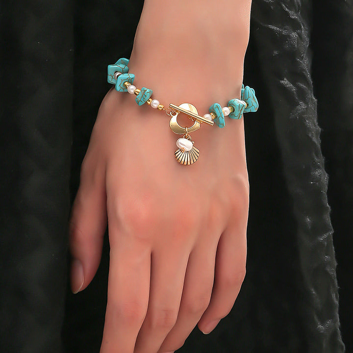 Bracelet pendentif en coquillage turquoise irrégulier Olivenorma