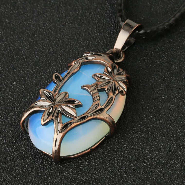 Collier en cristal enveloppé de fleurs en laiton et améthyste Olivenorma