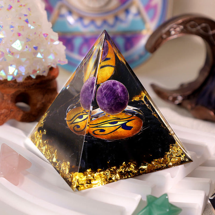 Pyramide d'orgone Oeil d'Horus en obsidienne améthyste Olivenorma