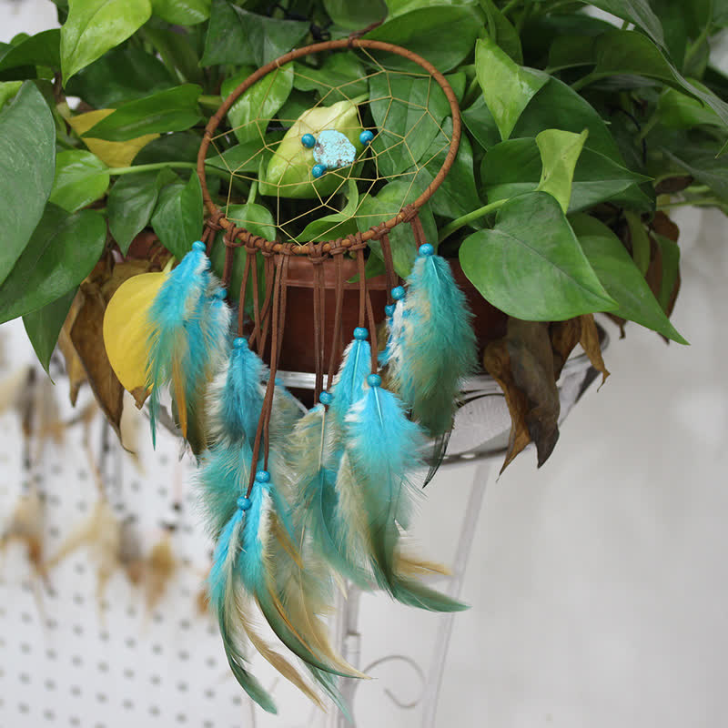 Olivenorma « Dream Knight » – Attrape-rêves en plumes turquoise 