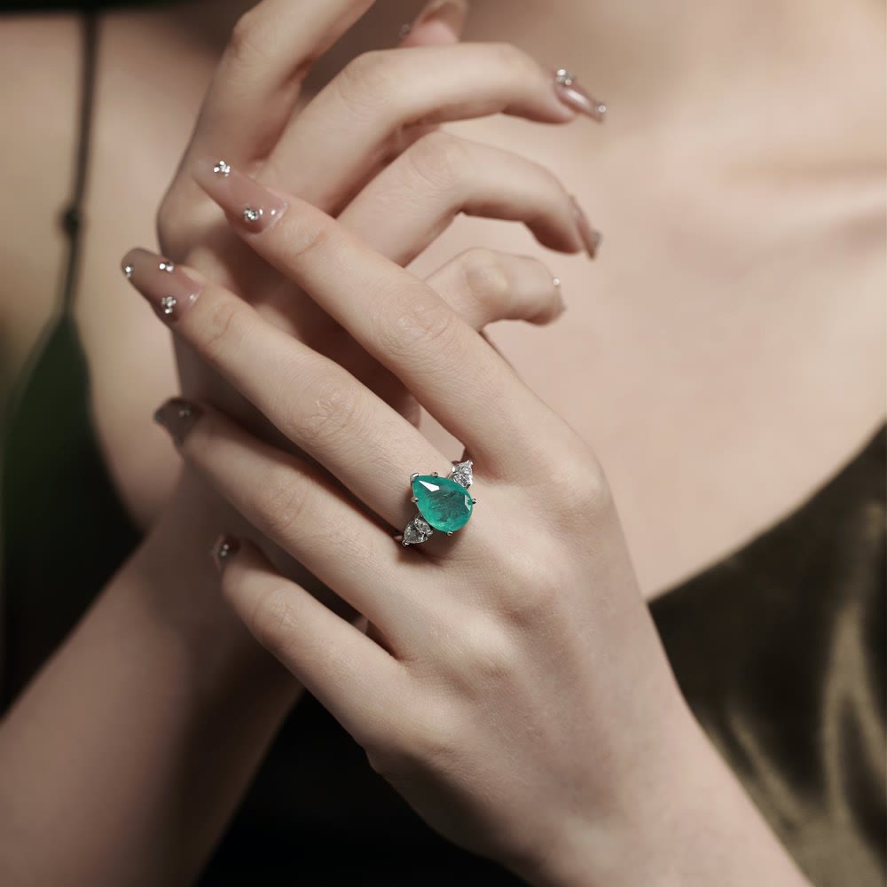 Bague exquise en zircon blanc et tourmaline Paraiba Olivenorma