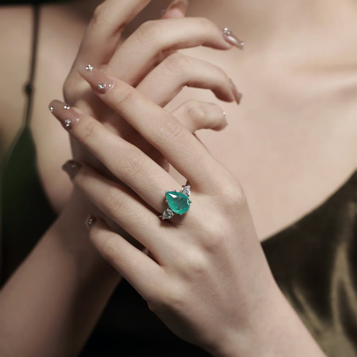 Bague exquise en zircon blanc et tourmaline Paraiba Olivenorma