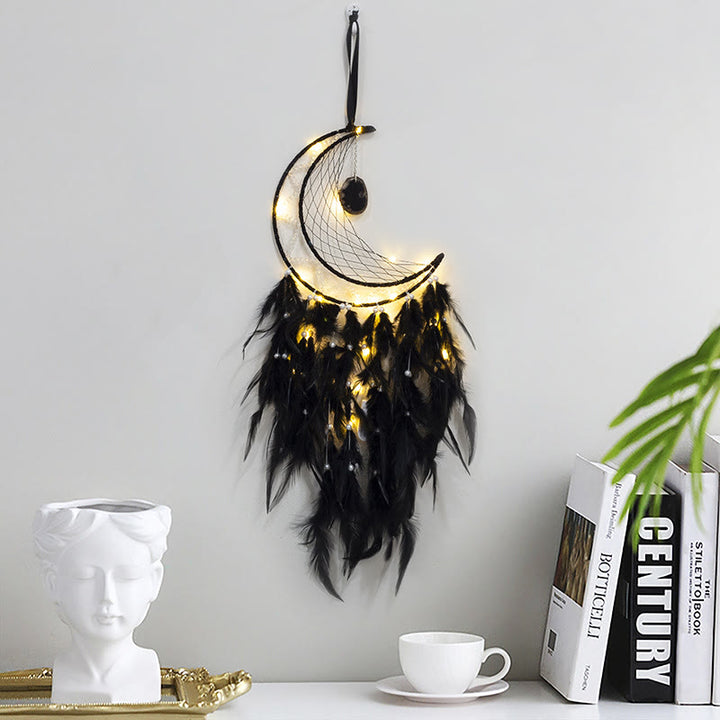 Pendentif Olivenorma en onyx noir et attrape-rêves en plumes noires