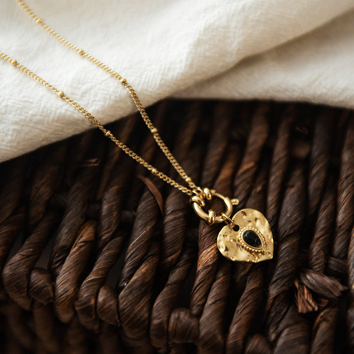 Collier pendentif coeur turquoise noir en acier titane Olivenorma 