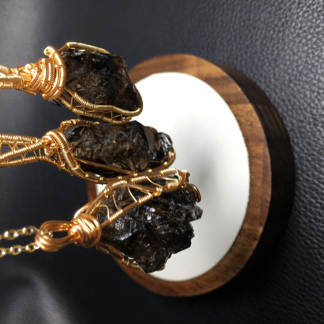 Collier avec pendentif enroulé en fil de cuivre et quartz fumé naturel Olivenorma