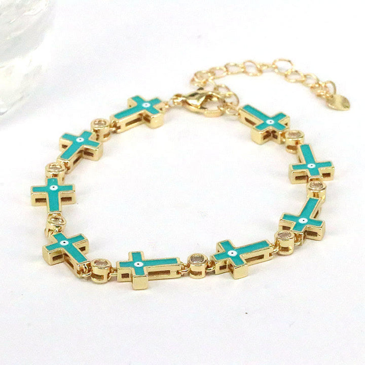 Bracelet en alliage de perles croisées contre le mauvais œil dégoulinant de couleur Olivenorma 