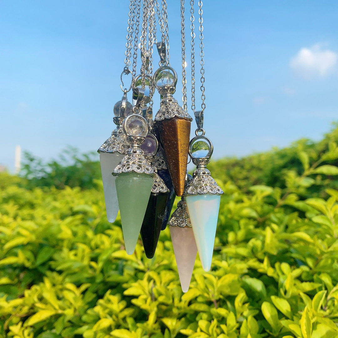 Colliers pendentifs à pointe de cristal de guérison Olivenorma