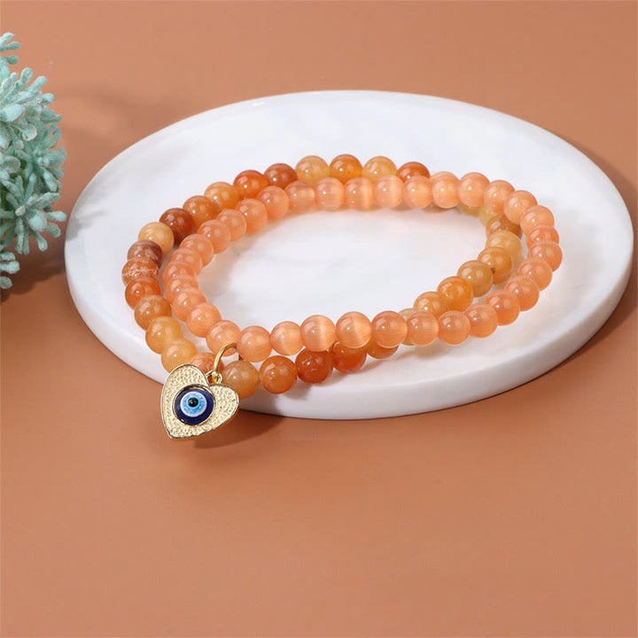 Bracelet double couche avec pendentif mauvais œil en pierre œil de chat Olivenorma