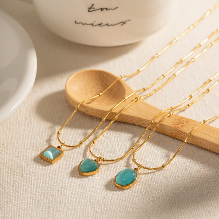 Collier pendentif carré en forme de cœur avec pierre œil de chat bleu Olivenorma 