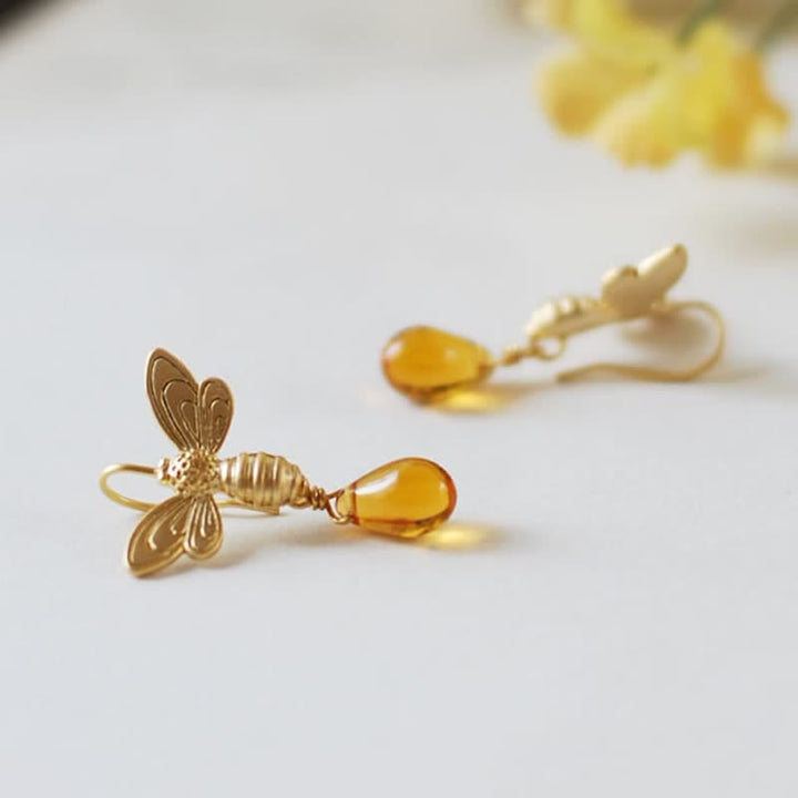 Boucles d'oreilles et collier en ambre avec pendentif en forme de goutte d'eau et de miel Olivenorma Bee Topaz